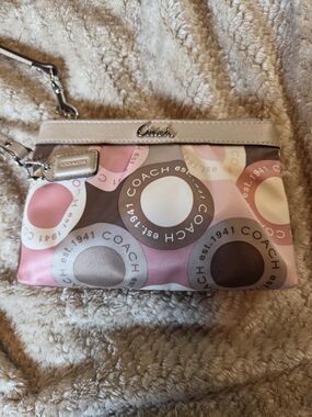 Coach Pink Multi Circle Signature Wristlet with Silver Hardware and Cream Trim